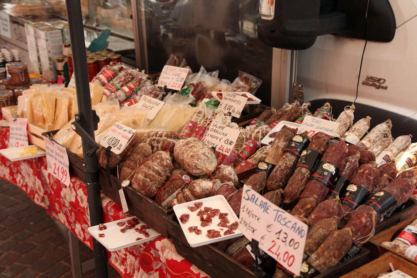 Salami and cured meats at a weekly market stall in Torri del Benaco