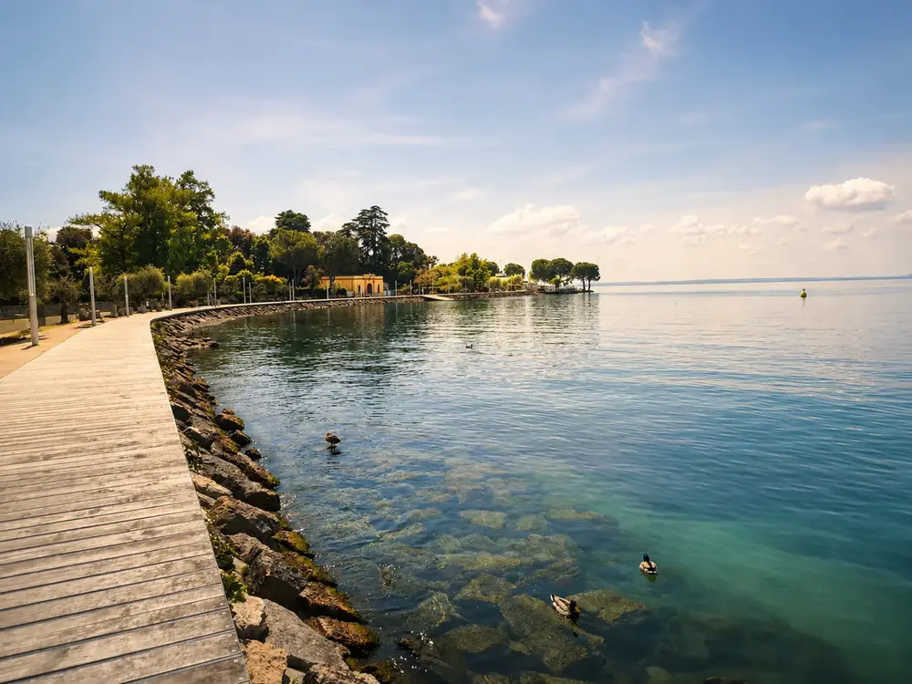 Wide lakefront path in Bardolino beside Lake Garda