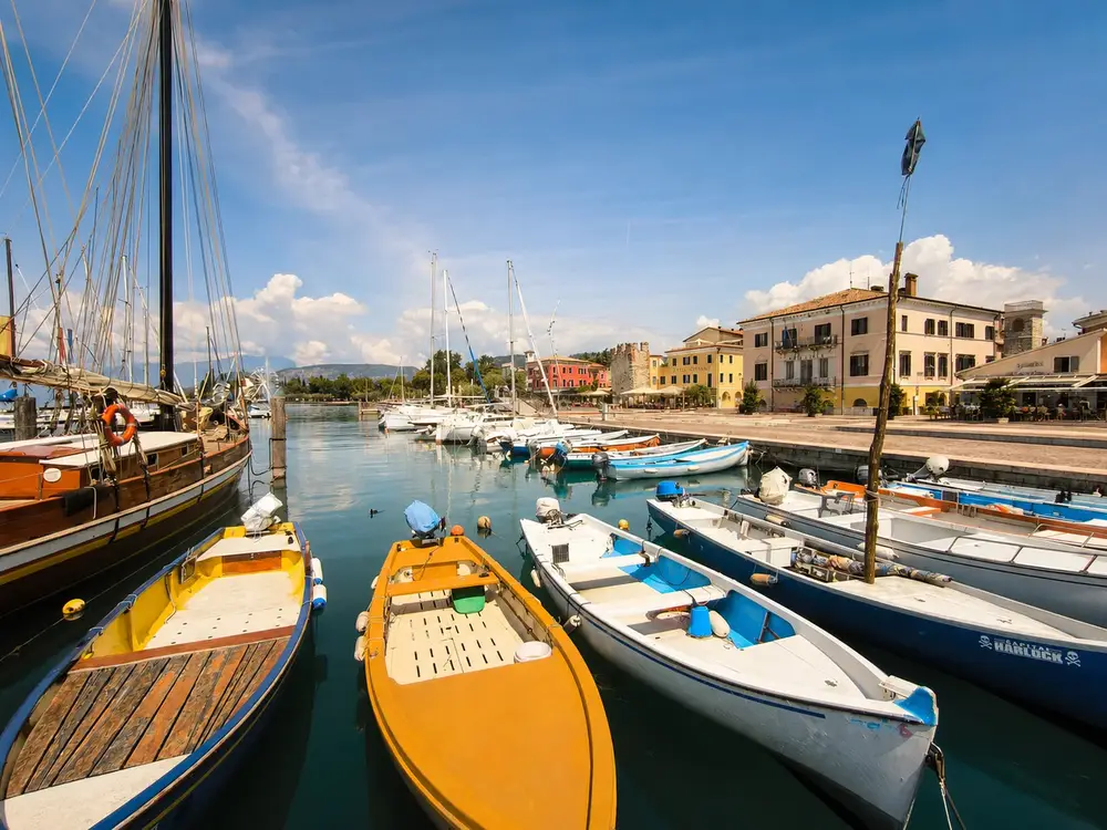 Small boats in Bardolino harbour on Lake Garda