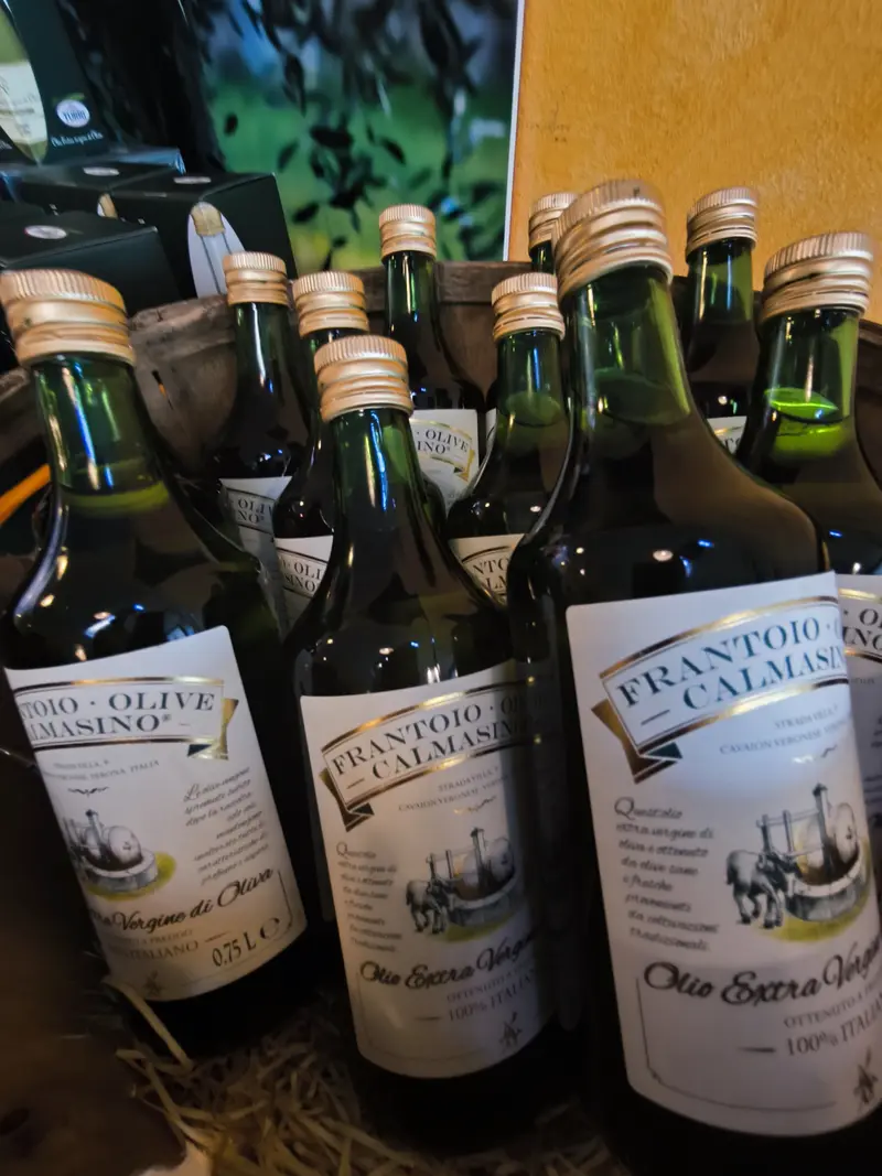 Close up of extra virgin olive oil bottles near Lake Garda